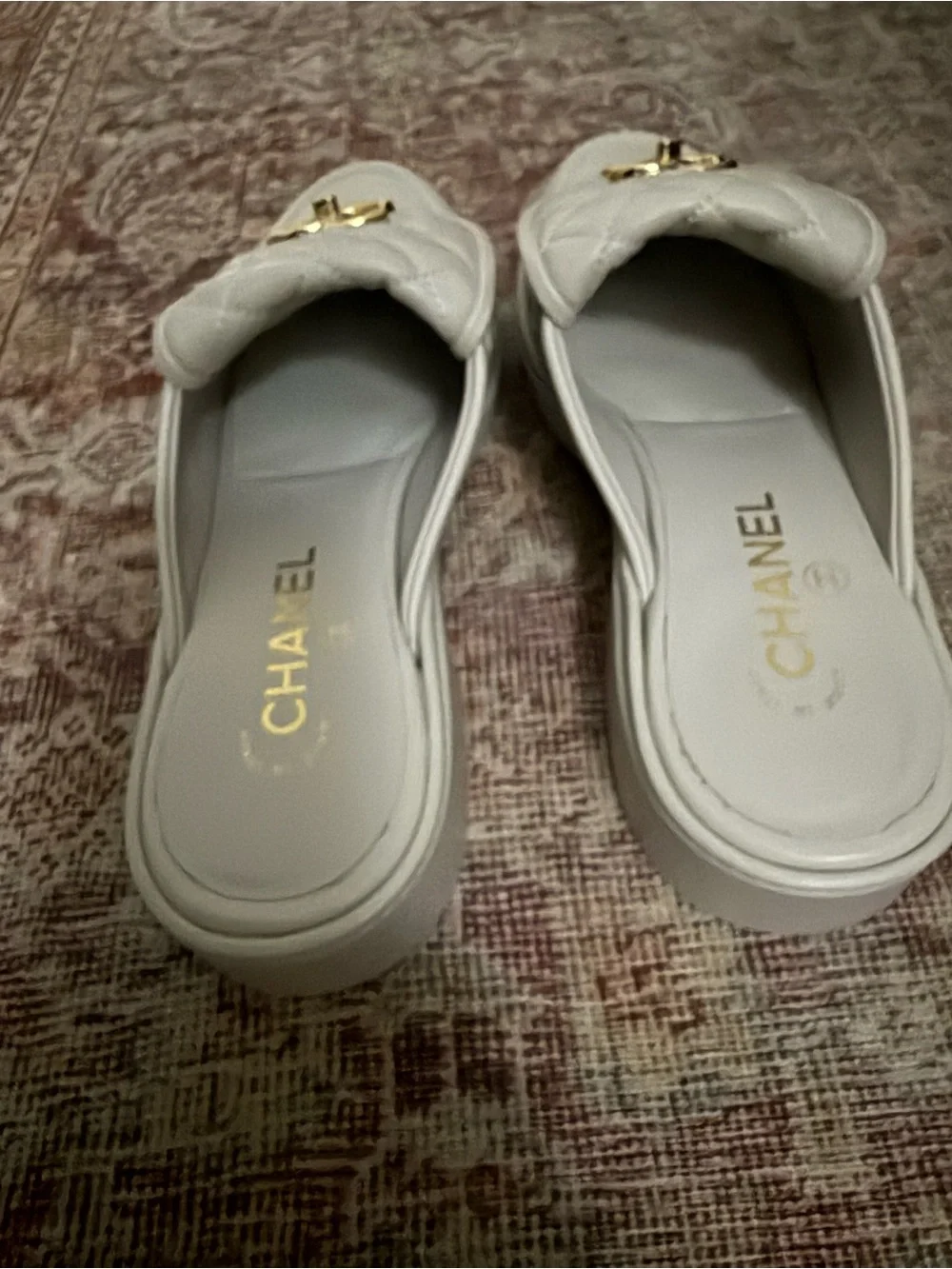 Chanel Quilted Leather Slide Mules in Light Gray with Gold CC